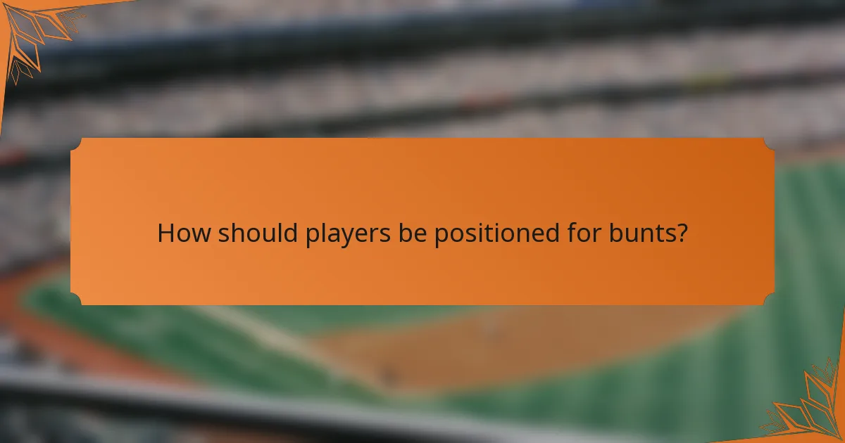How should players be positioned for bunts?